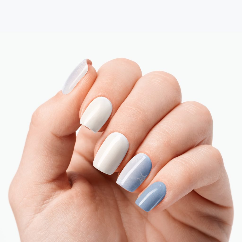 Icy Sparkle nail strips by Velvora, shown on real nails