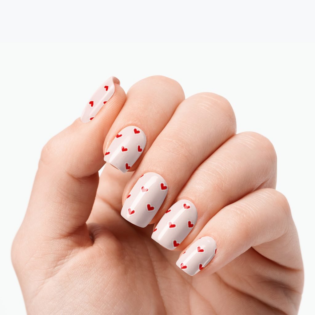 Love Hearts nail strips by Velvora, shown on real nails