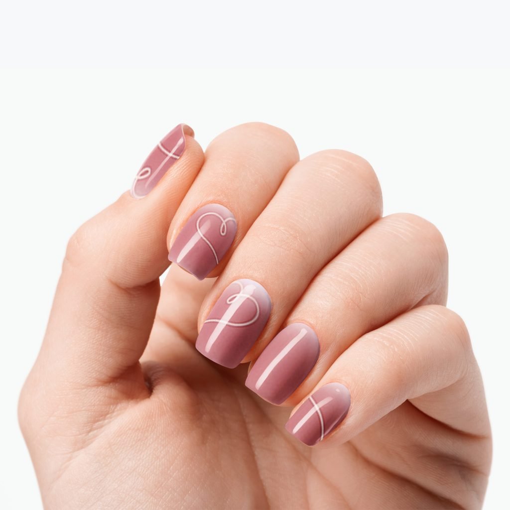 Love Script nail strips by Velvora, shown on real nails