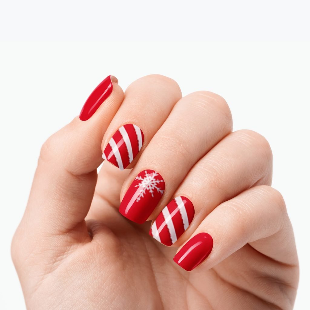 Merry & Bright nail strips by Velvora, shown on real nails